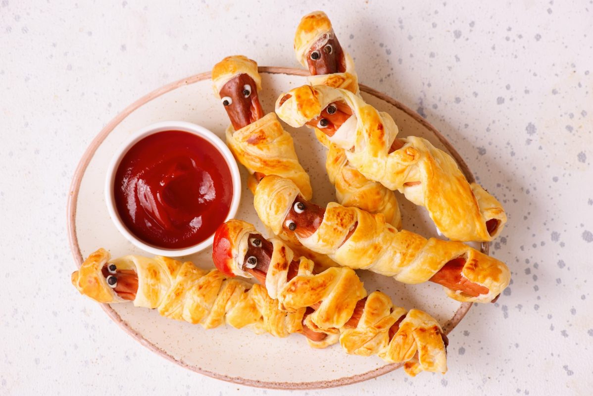 Mummy Sausages With Ketchup For Halloween.