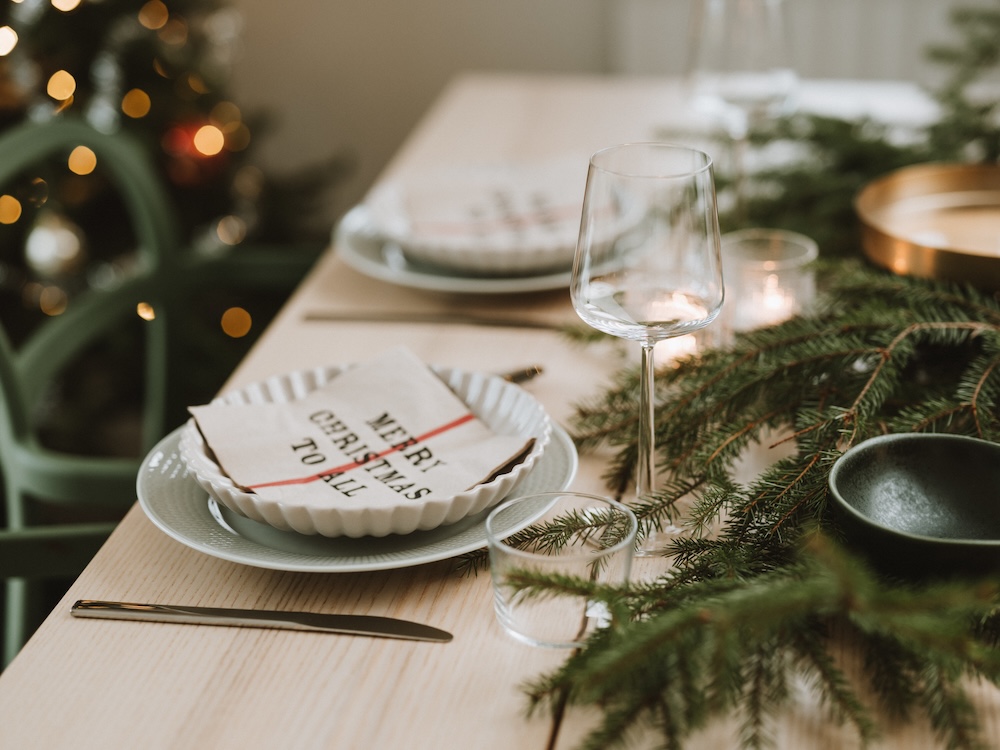 Christmas Table Place Setting Prepared For Dinner Party