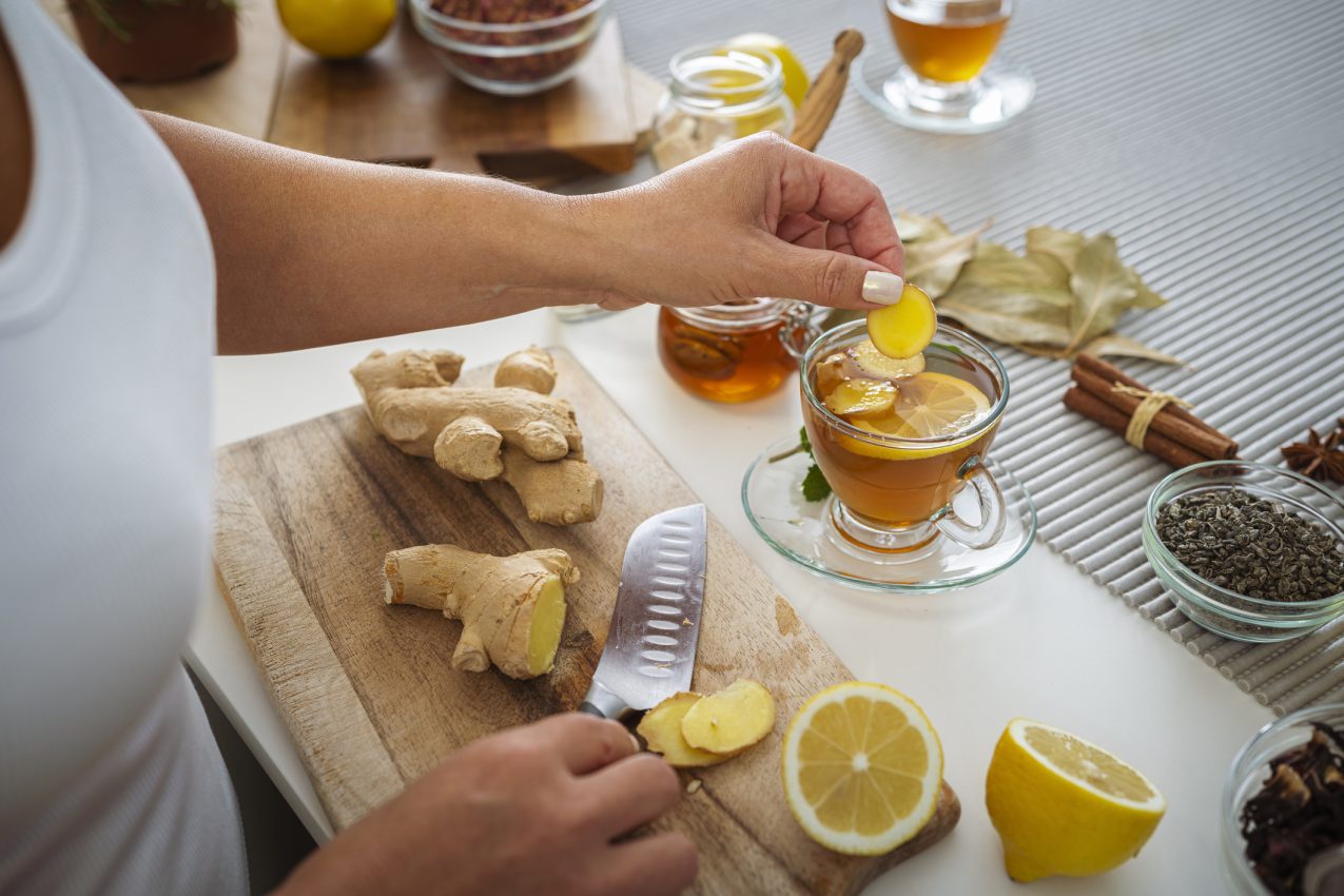 Woman Preparing Ginger And Lemon Hot Tea